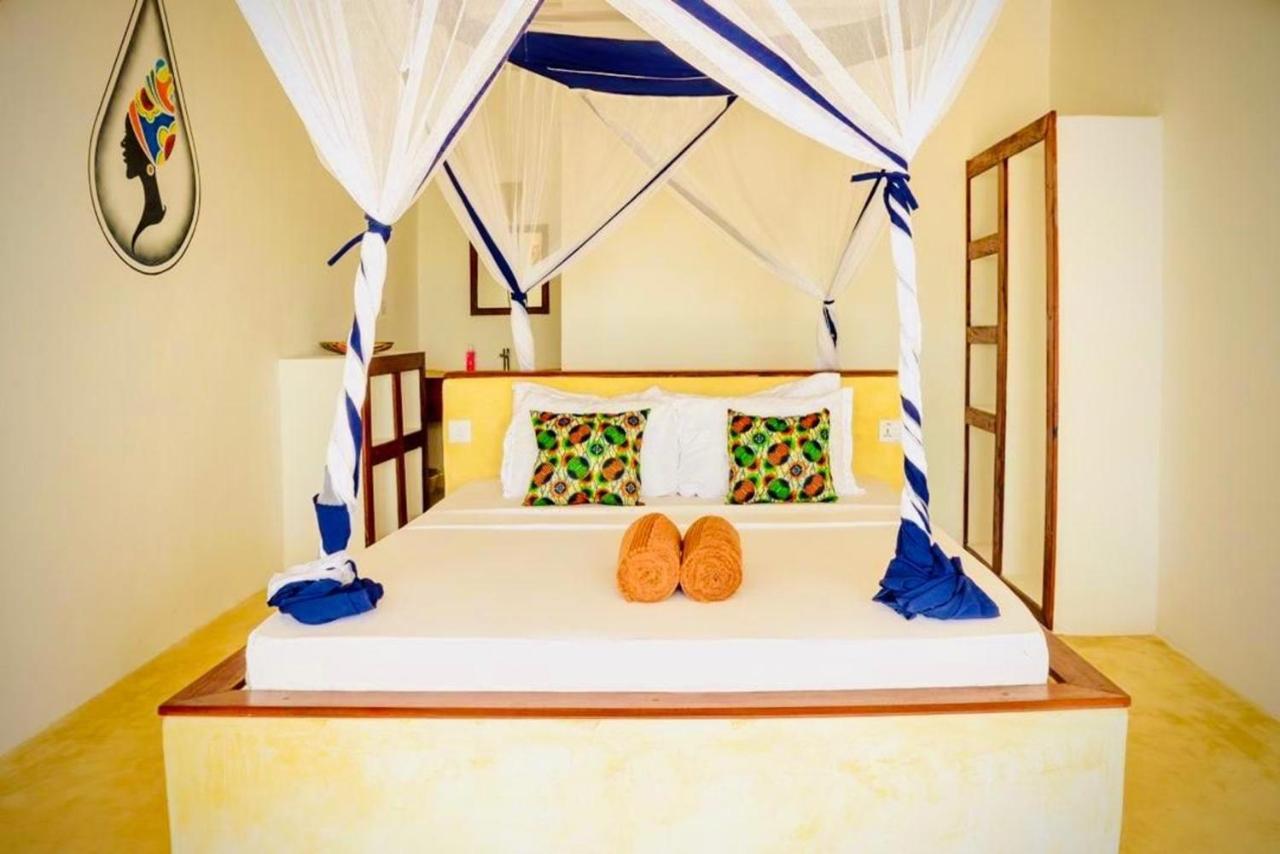 Mnana Beach Bungalows Pingwe Eksteriør billede
