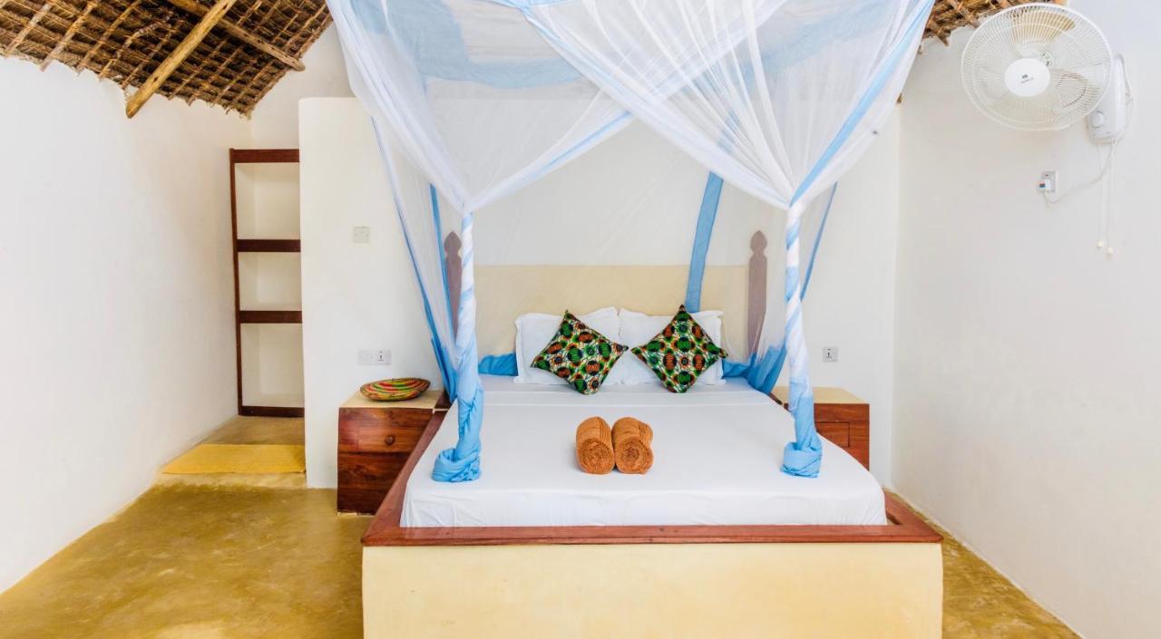 Mnana Beach Bungalows Pingwe Eksteriør billede