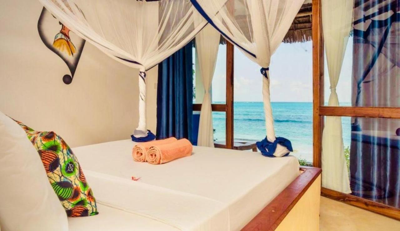 Mnana Beach Bungalows Pingwe Eksteriør billede